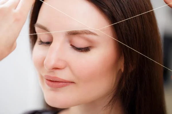 Brow threading and eyebrow shaping for a clean, defined look Brow threading and eyebrow shaping for a clean, defined look